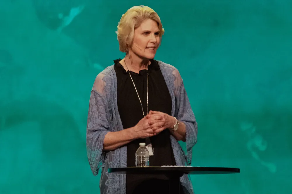 Gayla Grace speaking at an event