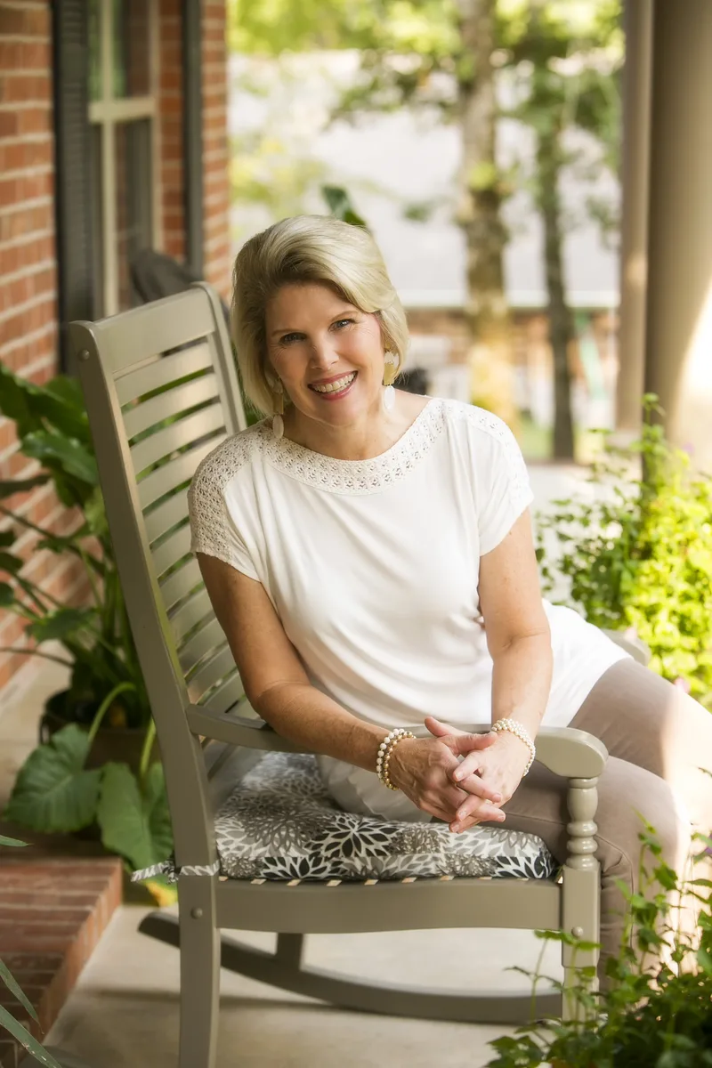 Gayla Grace in a rocking chair